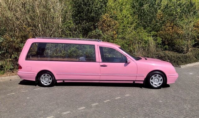 IMG_1705-640w Pink funeral limousine parked on street